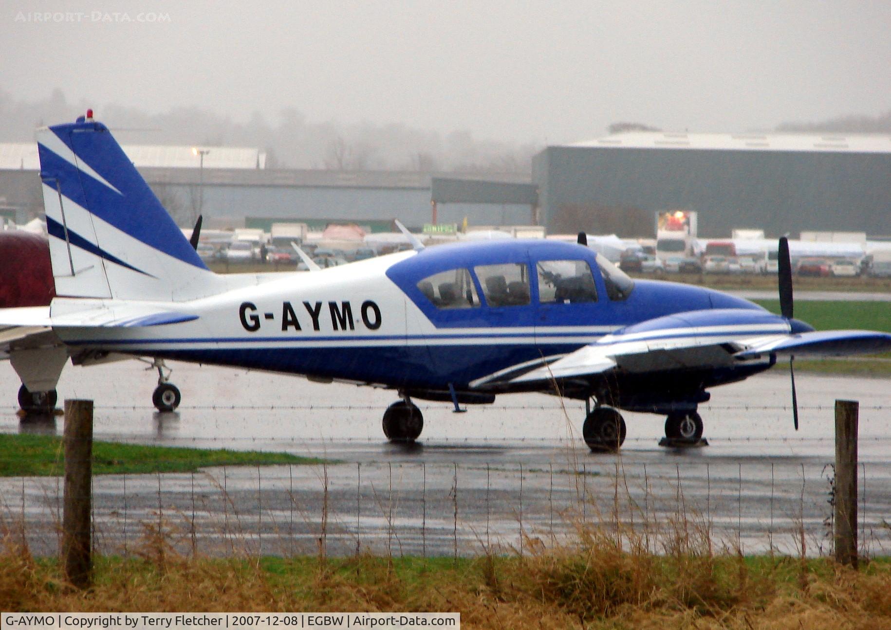 G-AYMO, 1965 Piper PA-23-250 Aztec C/N 27-2995, Pa-23-250 on a wet morning at Wellesbourne