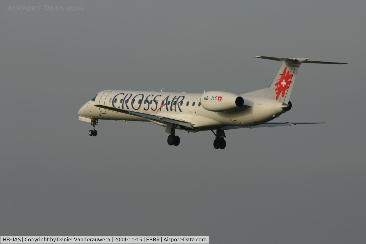 HB-JAS, 2002 Embraer EMB-145LU (ERJ-145LU) C/N 145559, several seconds before touching rwy 25L