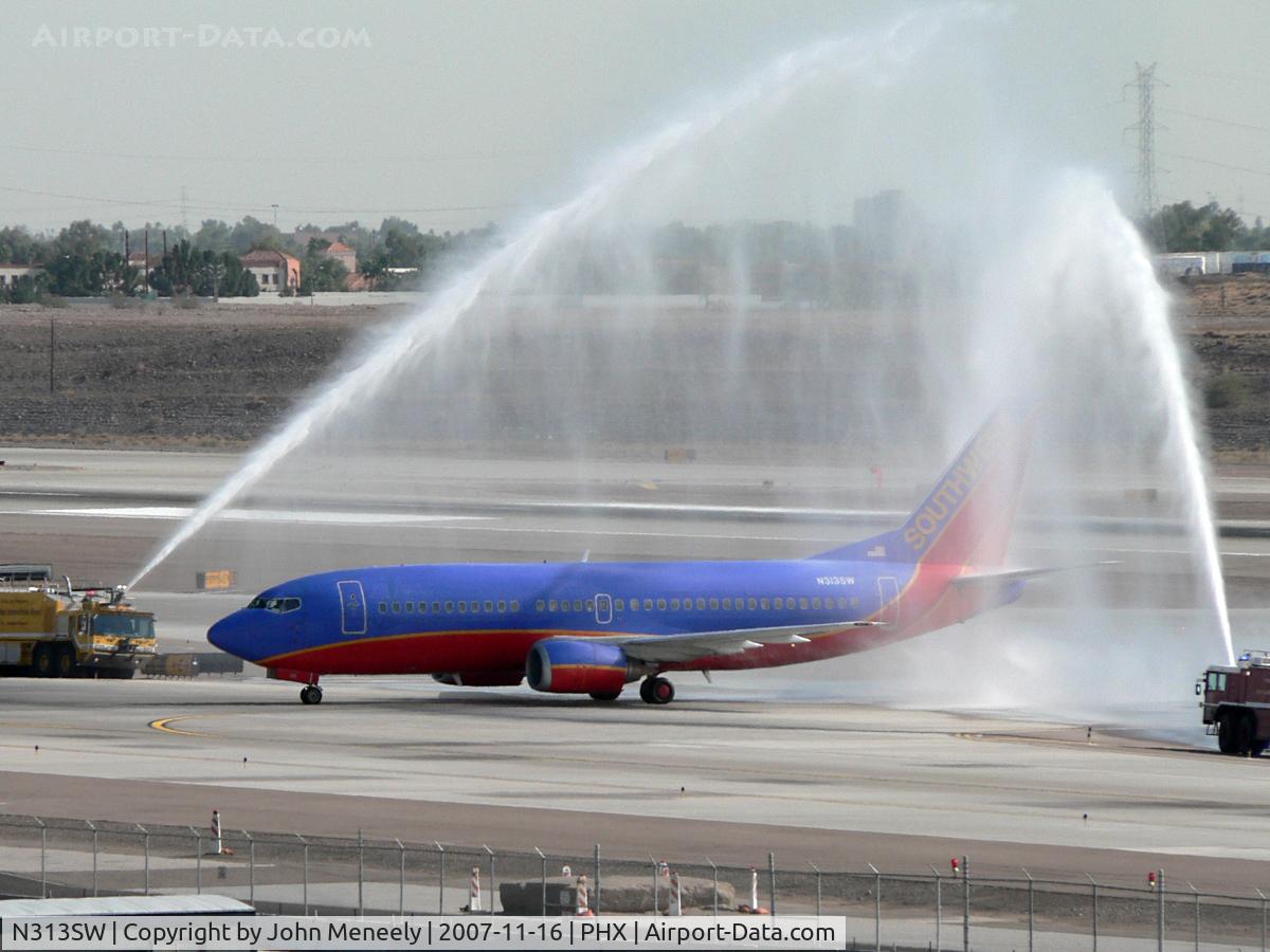 N313SW, 1986 Boeing 737-3H4 C/N 23335, A firehose salute