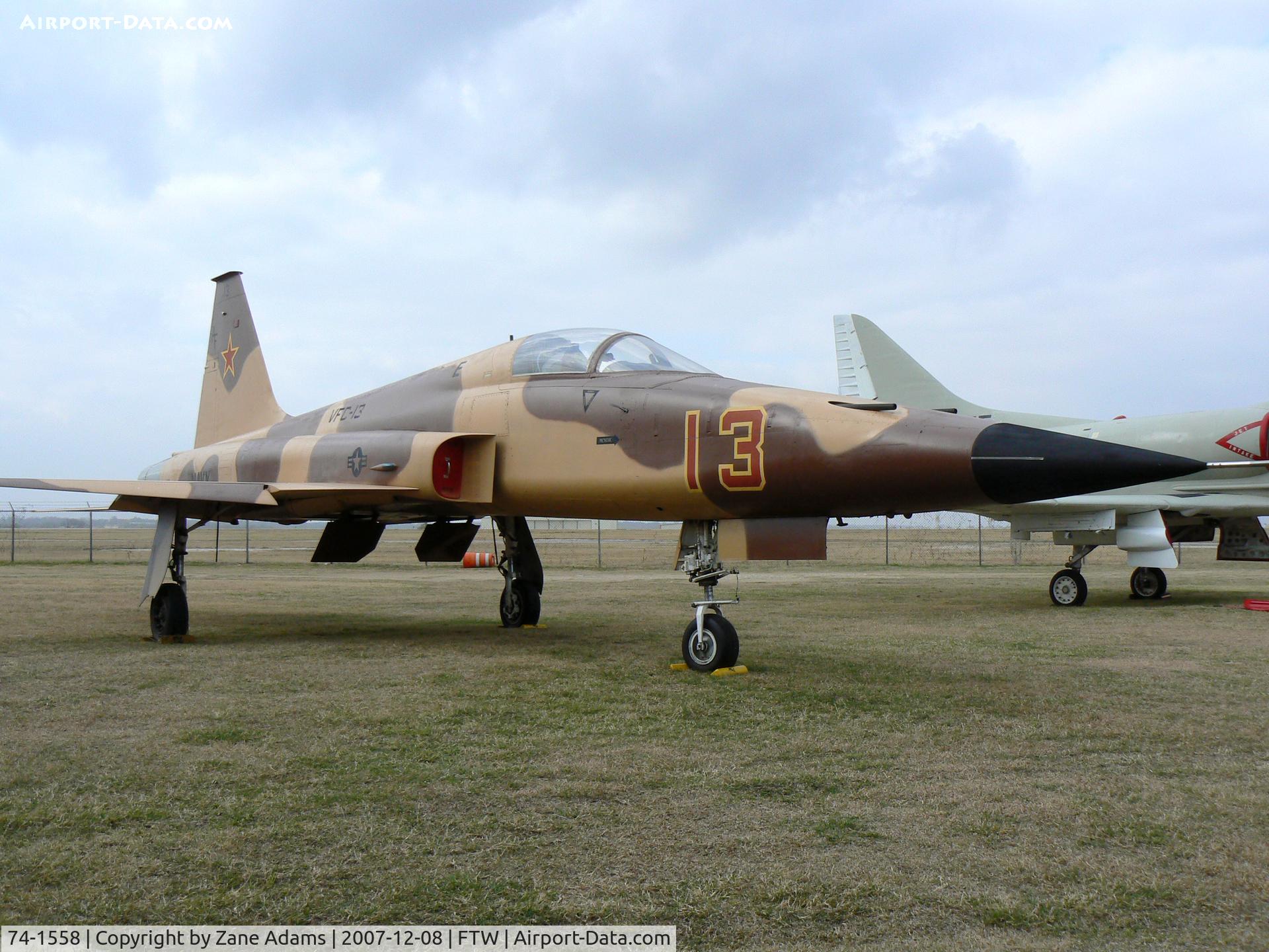 74-1558, 1974 Northrop F-5E Tiger II C/N R.1218, On Display at OV-10 Bronco / Vintange Flying Museum, Ft. Worth, TX - This aircraft has wings from a high time Swiss F-5 (the US wings were sent to the Swiss to keep their airplanes flying. Painted as USN Agressor as last operational.