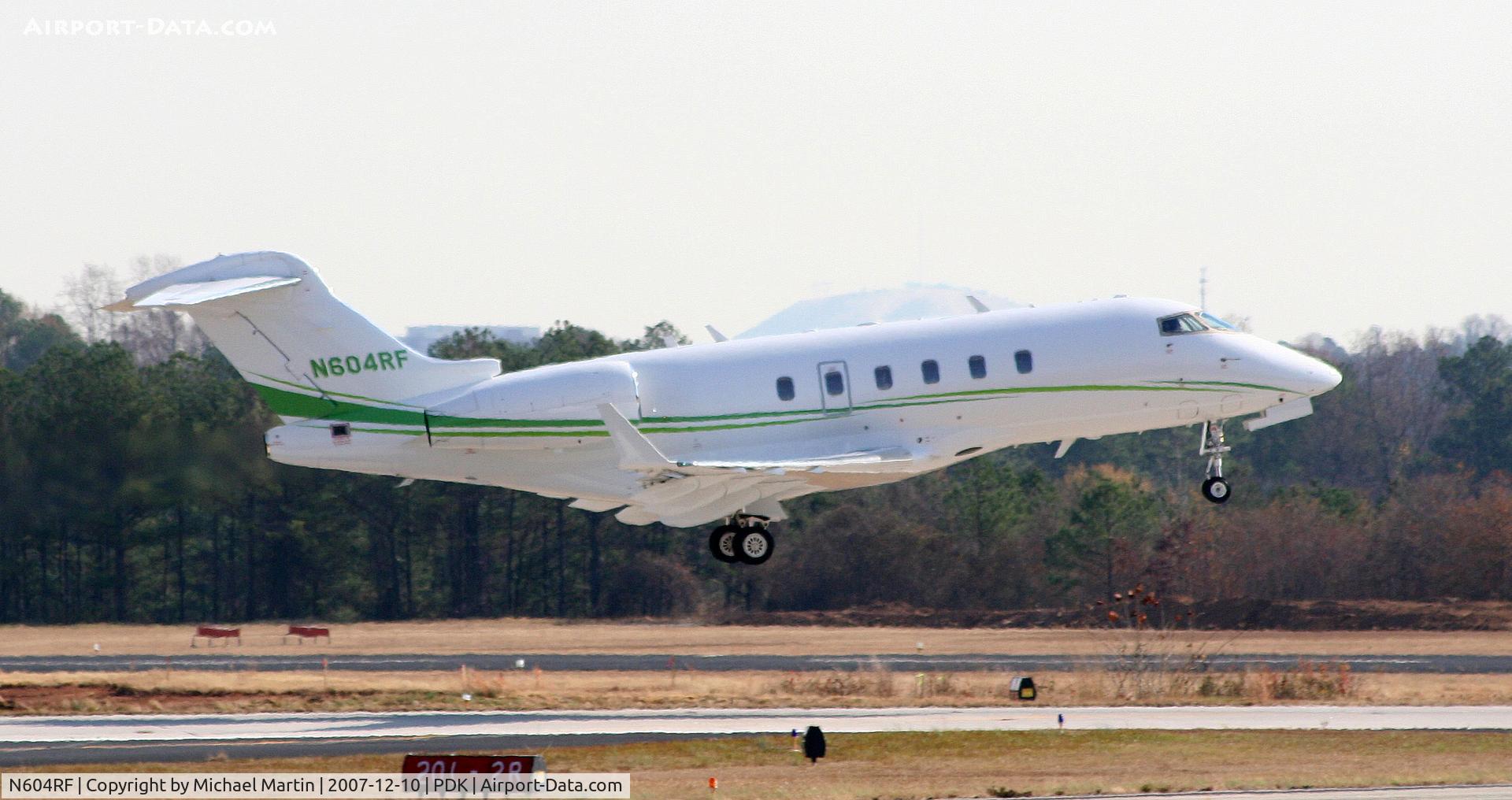 N604RF, 2004 Bombardier Challenger 300 (BD-100-1A10) C/N 20026, Taking off from Runway 20L
