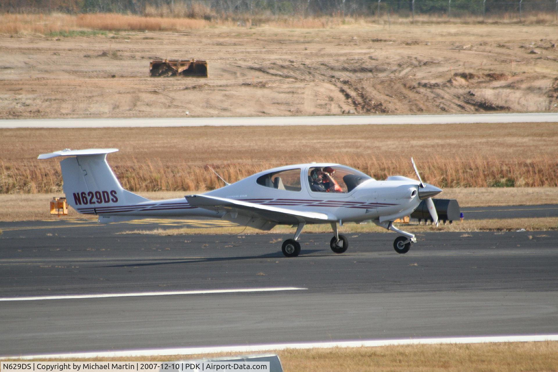 N629DS, 2006 Diamond DA-40 Diamond Star C/N 40.629, Landing Runway 20R