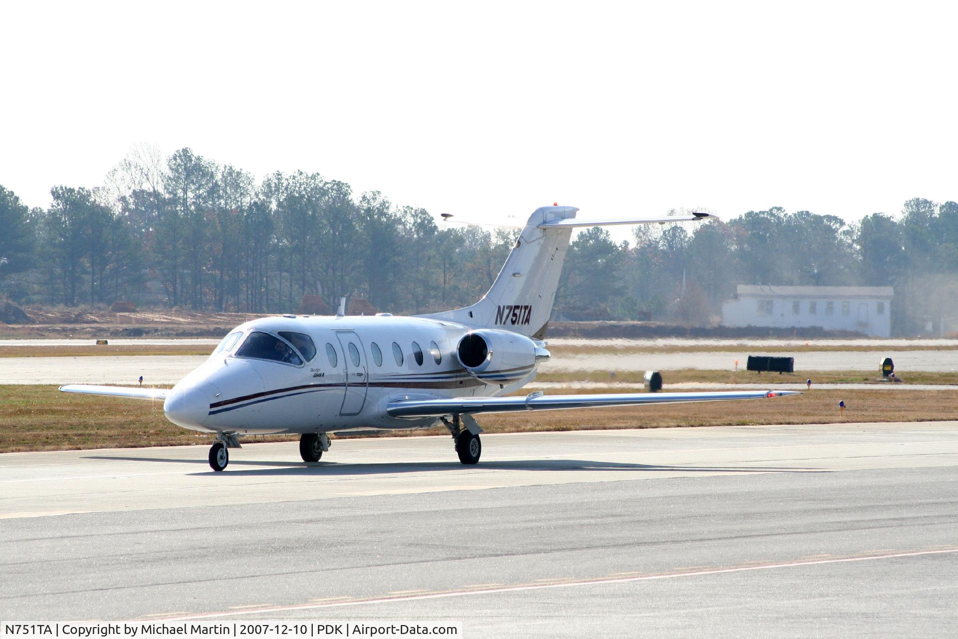 N751TA, 1999 Raytheon Aircraft Company 400A C/N RK-225, Taxing to Epps Air Service