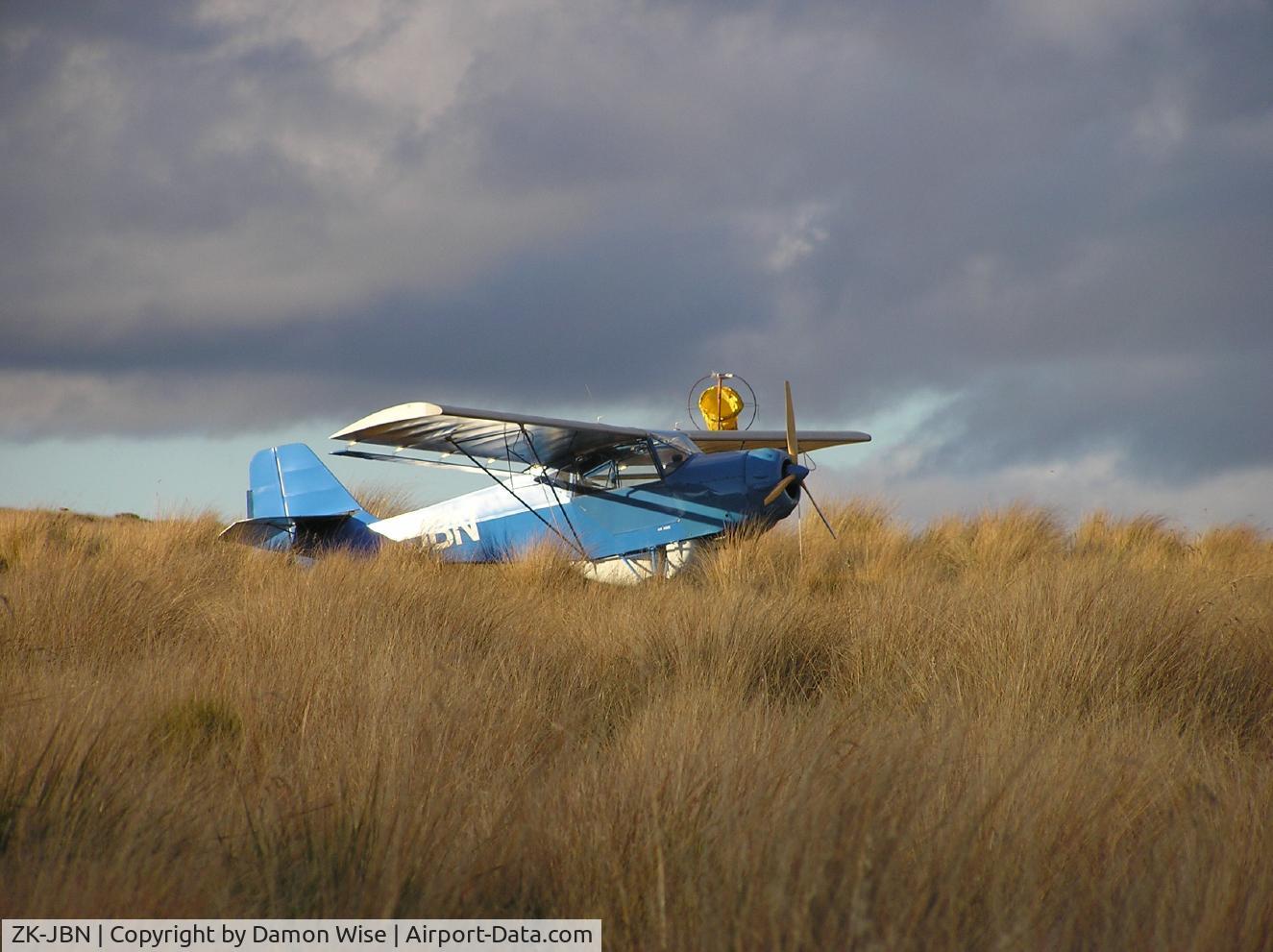 ZK-JBN, Denney Kitfox III C/N 10864, JBN - Pegged down in NZ native tussock.  Ruahine Corner airstrip,  Ruahine Forest Park, NZ