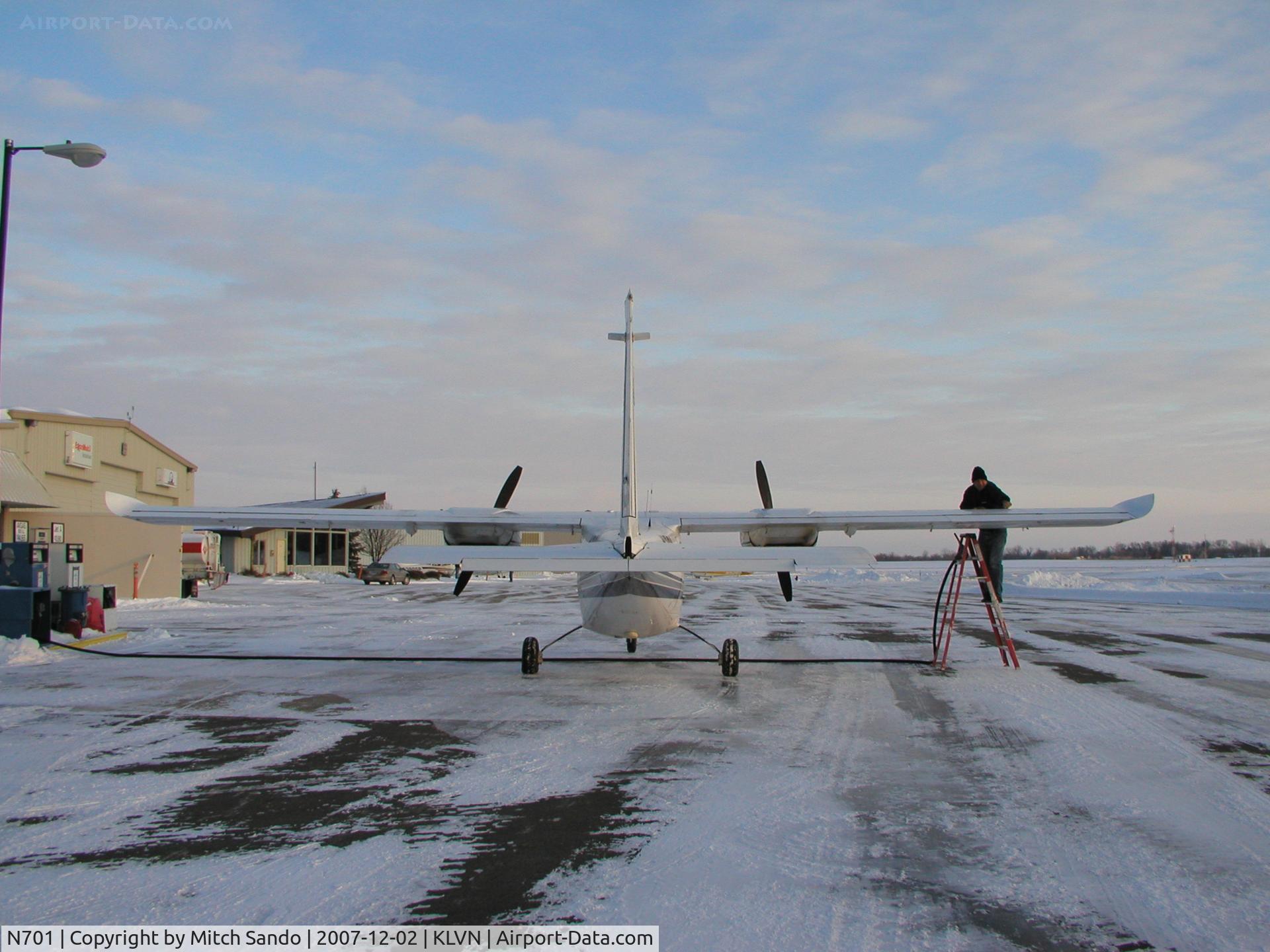N701, 1990 Partenavia P-68 Observer 2 C/N 390-03-0B2, Parked at the fuel pumps.