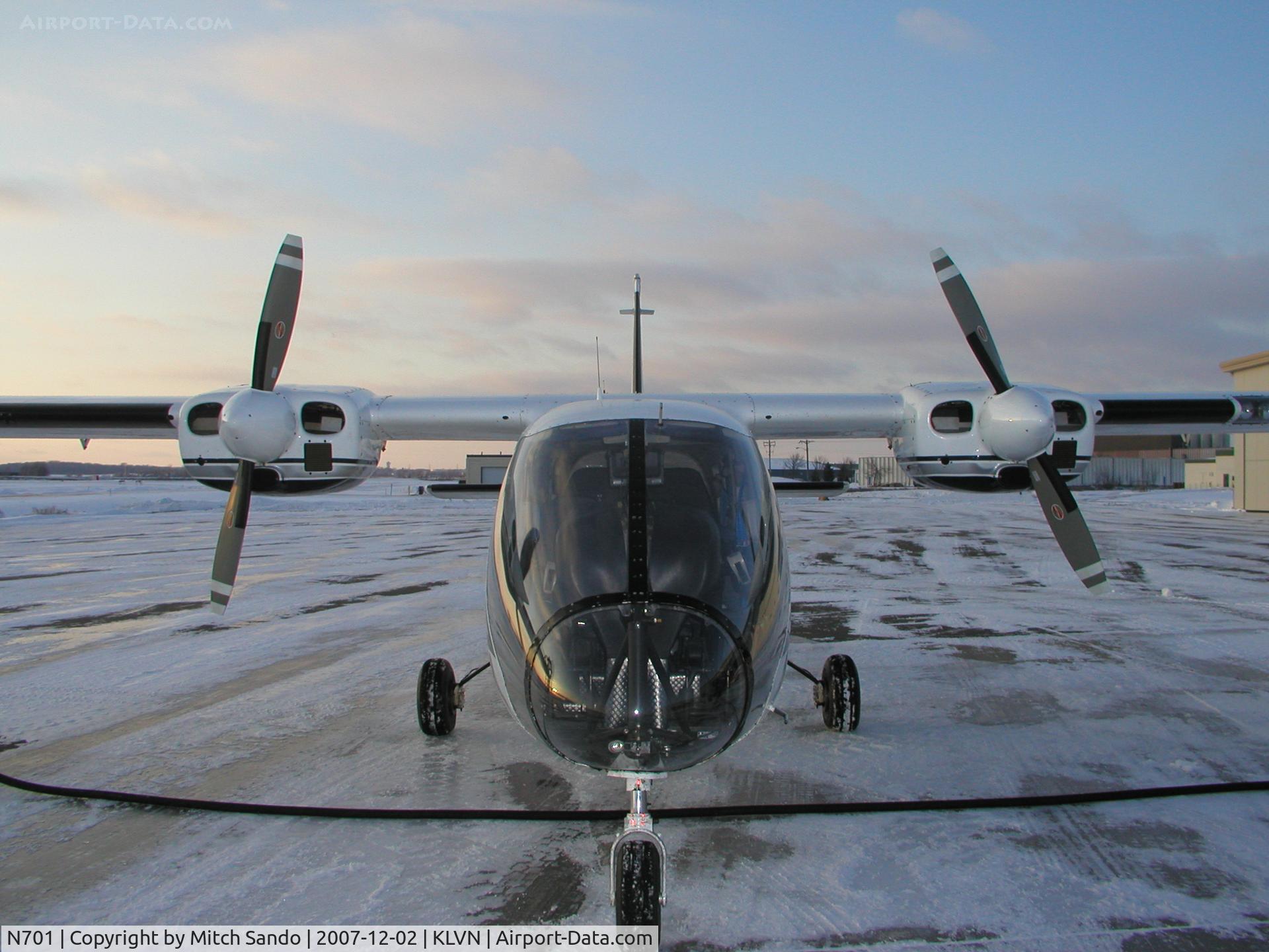 N701, 1990 Partenavia P-68 Observer 2 C/N 390-03-0B2, Parked at the fuel pumps.