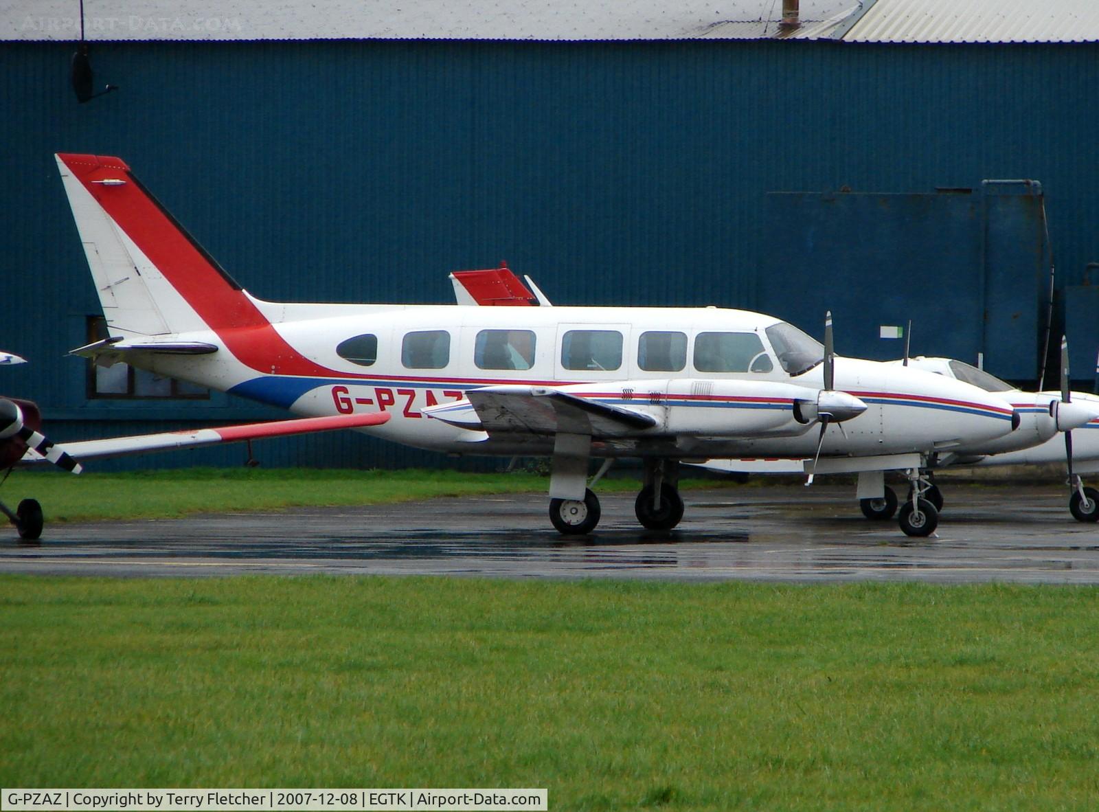 G-PZAZ, 1974 Piper PA-31-350 Navajo Chieftain C/N 31-7405214, Piper Navajo at a very wet Oxford Kidlington