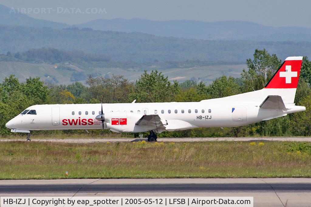 HB-IZJ, 1995 Saab 2000 C/N 2000-015, taxi on bravo - with cargodoor of HB-IZK