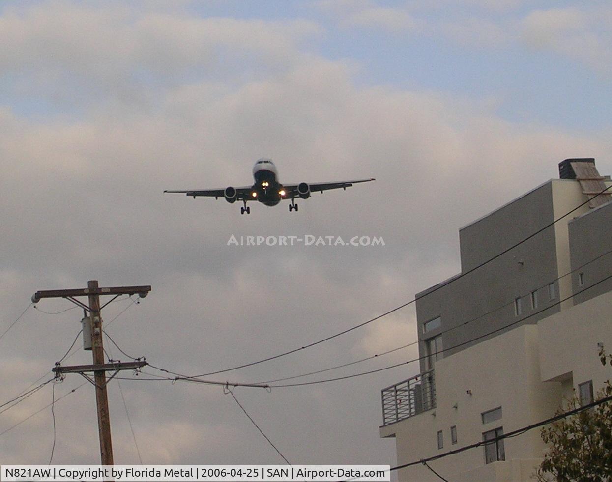 N821AW, 2000 Airbus A319-132 C/N 1406, America West buzzing Laurel Street