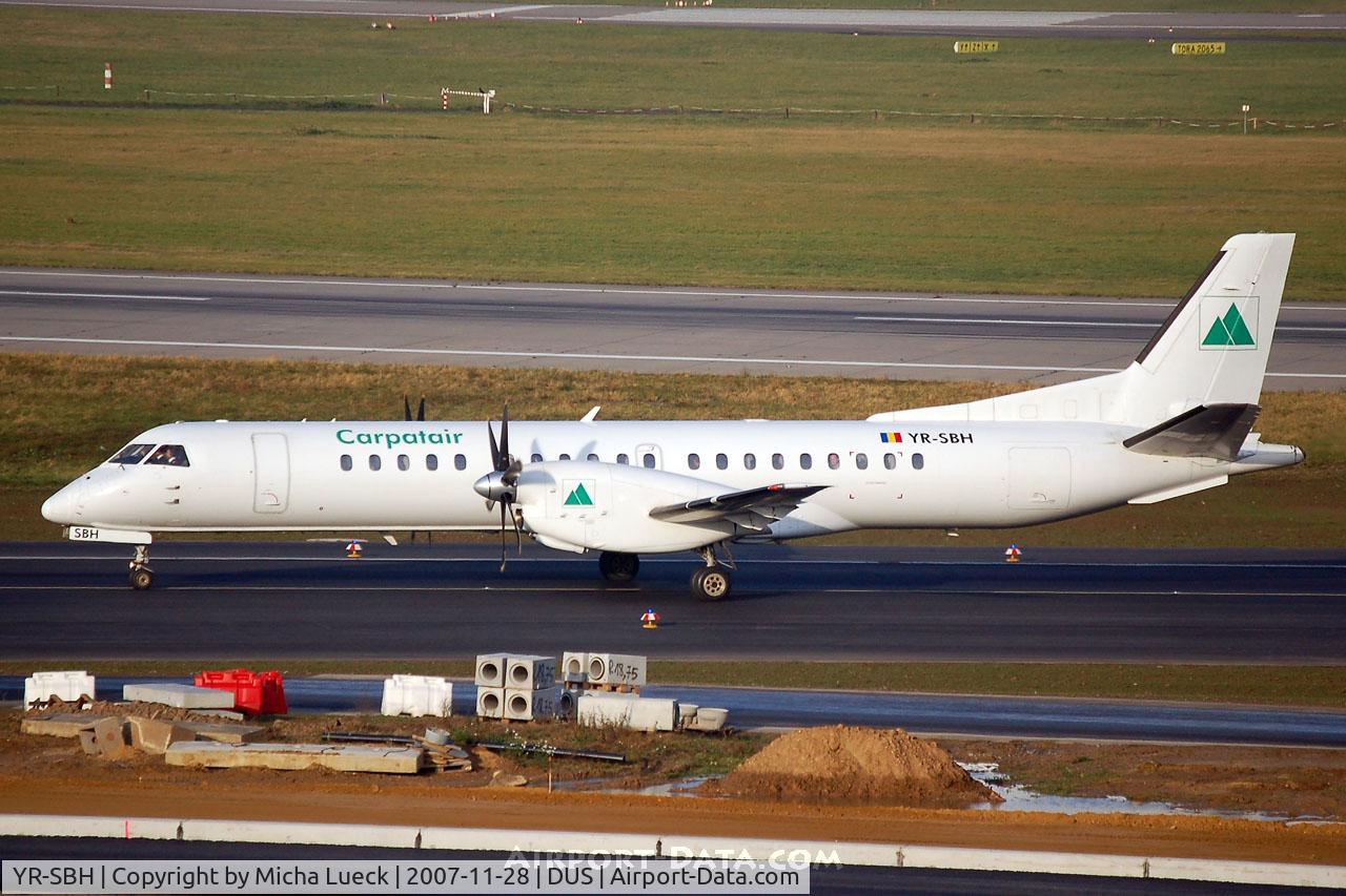 YR-SBH, 1998 Saab 2000 C/N 2000-050, Taxiing to the gate