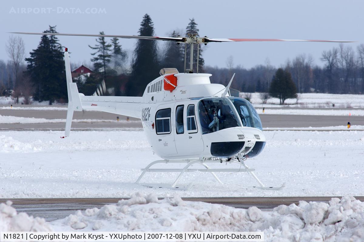 N1821, Bell 206L-4 LongRanger IV LongRanger C/N 52366, Landing by Esso ramp.