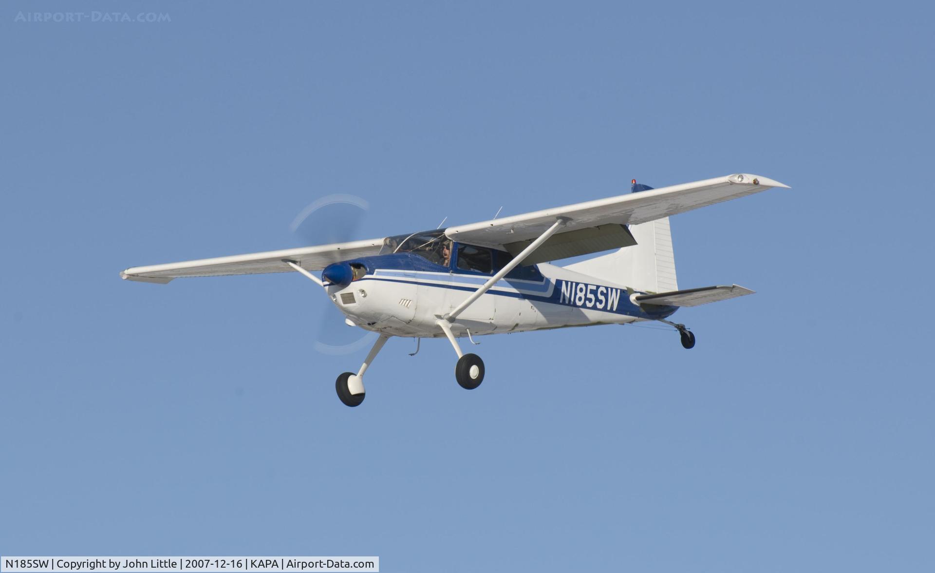 N185SW, 1977 Cessna A185F Skywagon 185 C/N 18503199, Touch and Go 17L