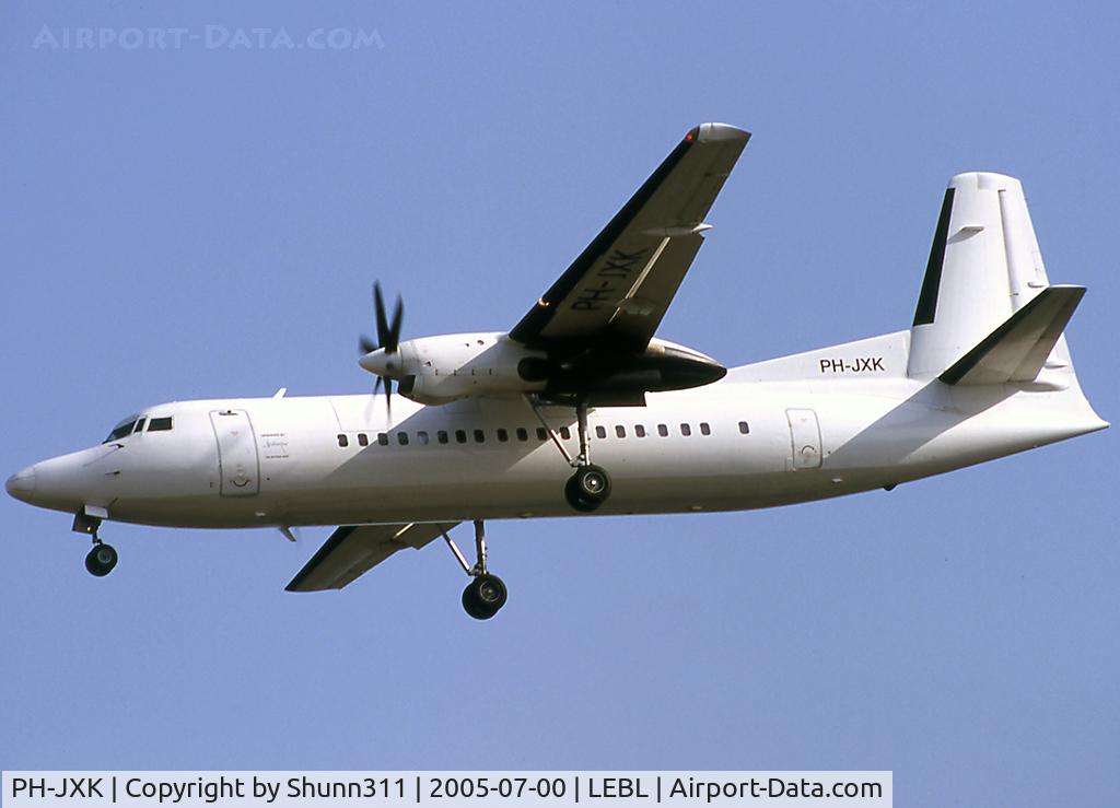 PH-JXK, 1991 Fokker 50 C/N 20233, Landing rwy 25R with additional 'operated by Denim Air' titles near door