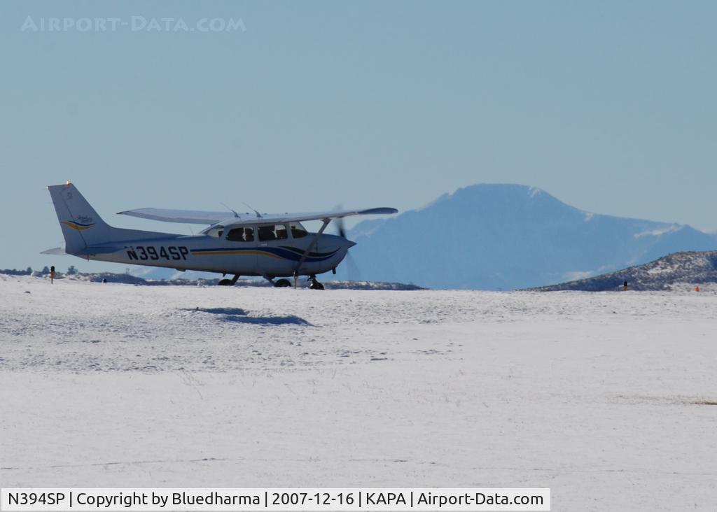 N394SP, 1999 Cessna 172S C/N 172S8291, Taxi to takeoff with Pikes Peak in the background.
