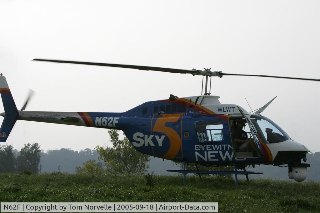 N62F, 1995 Bell 206B C/N 4341, On powerline patrol somewhere in Kentucky, we had to land to wipe a bug off of teh nosemount camera lens.