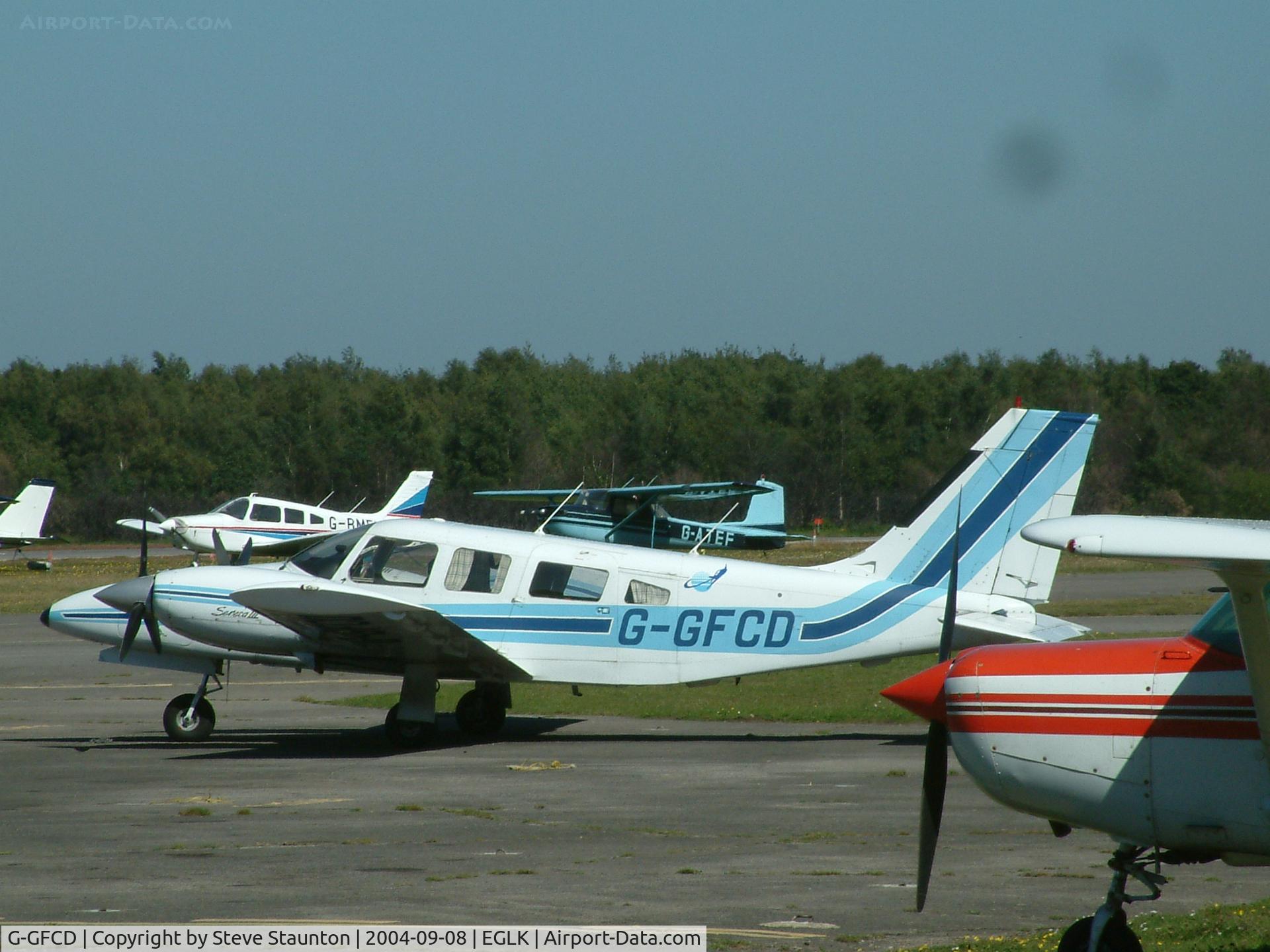 G-GFCD, 1981 Piper PA-34-220T Seneca III C/N 34-8133073, Taken at Blackbushe Airport 8th September 2004 (sorry about the black spot on the lens)