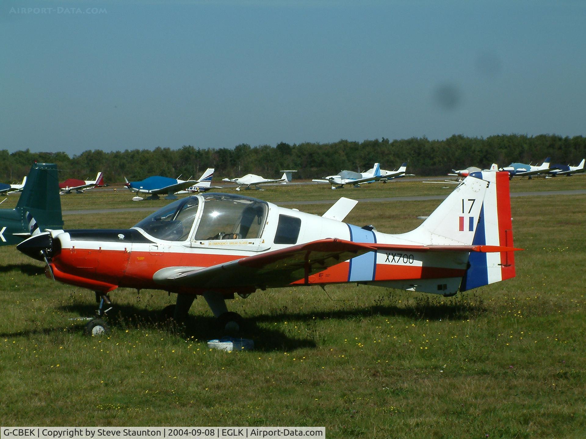 G-CBEK, 1975 Scottish Aviation Bulldog T.1 C/N BH120/349, Taken at Blackbushe Airport 8th September 2004 (sorry about the black spot on the lens)