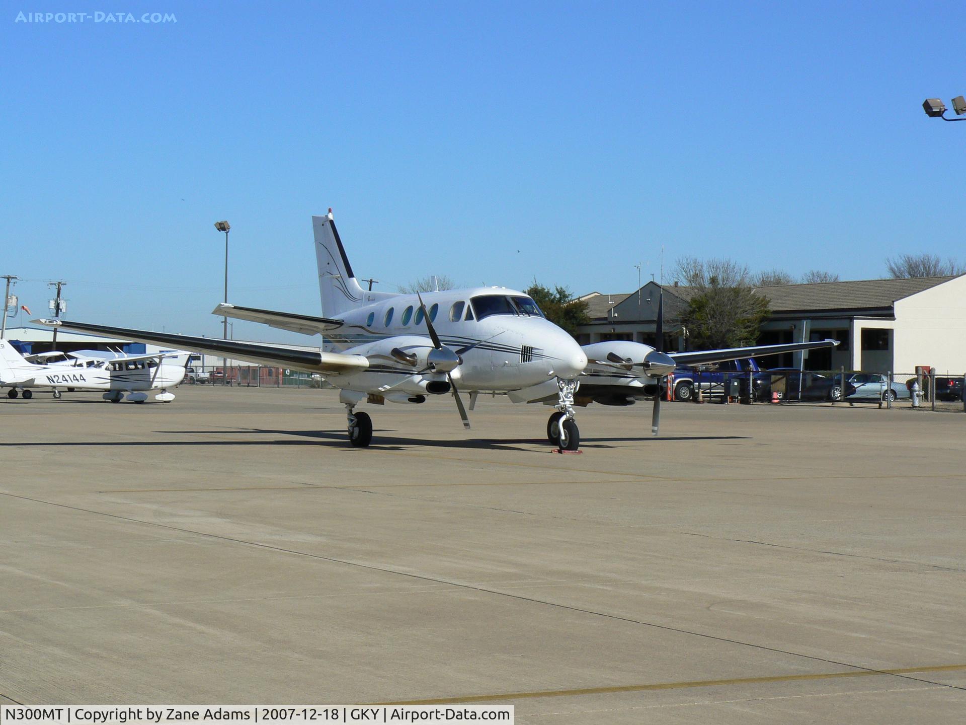 N300MT, 1975 Beech E-90 King Air C/N LW-143, On the ramp at Arlington Municipal