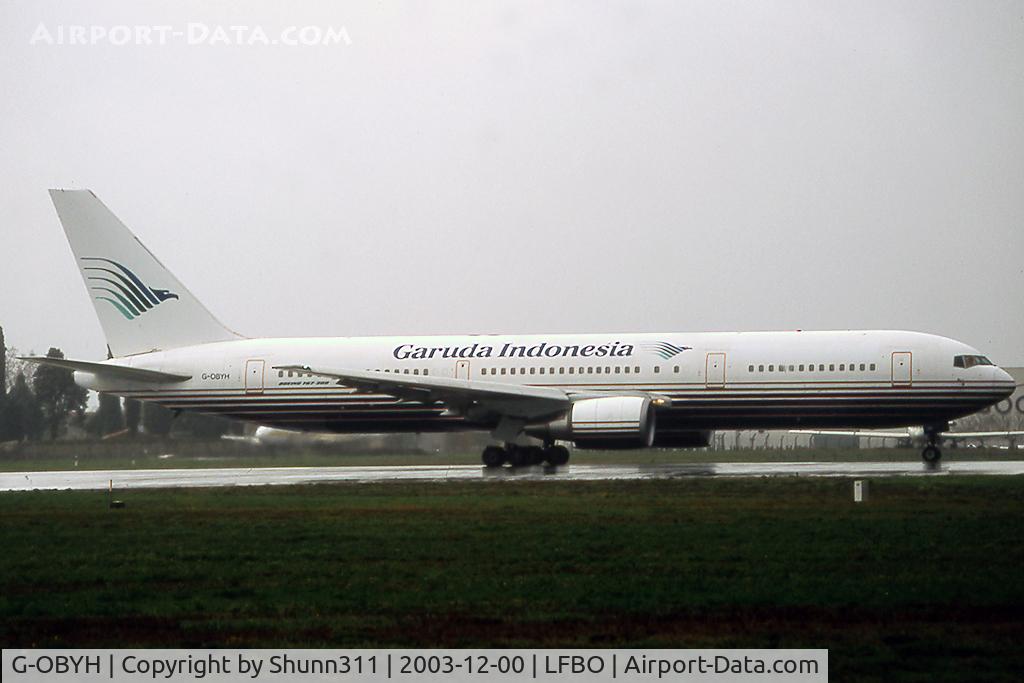 G-OBYH, 1999 Boeing 767-304/ER C/N 28883, Ready to take off rwy 32R with special Garuda Indonesian titles for Hadj 2003