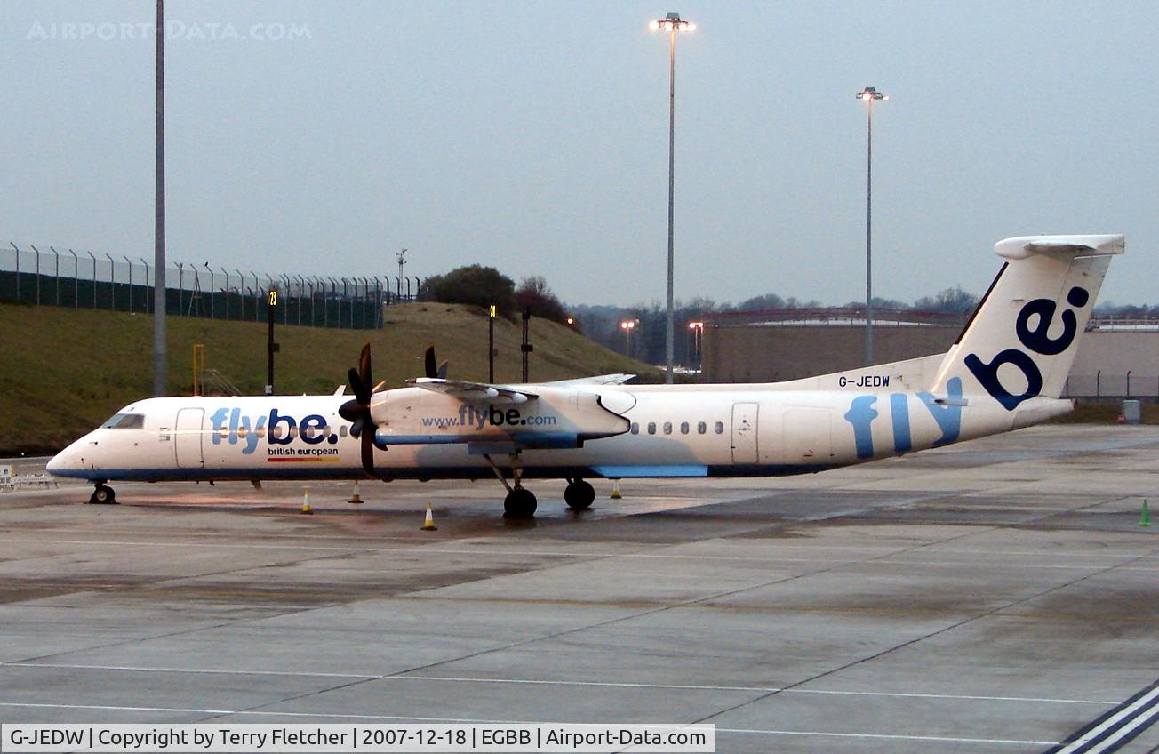 G-JEDW, 2004 De Havilland Canada DHC-8-402Q Dash 8 C/N 4093, Dash 8 on stand as dawn breaks on a wintery morning at Birmingham International (UK)