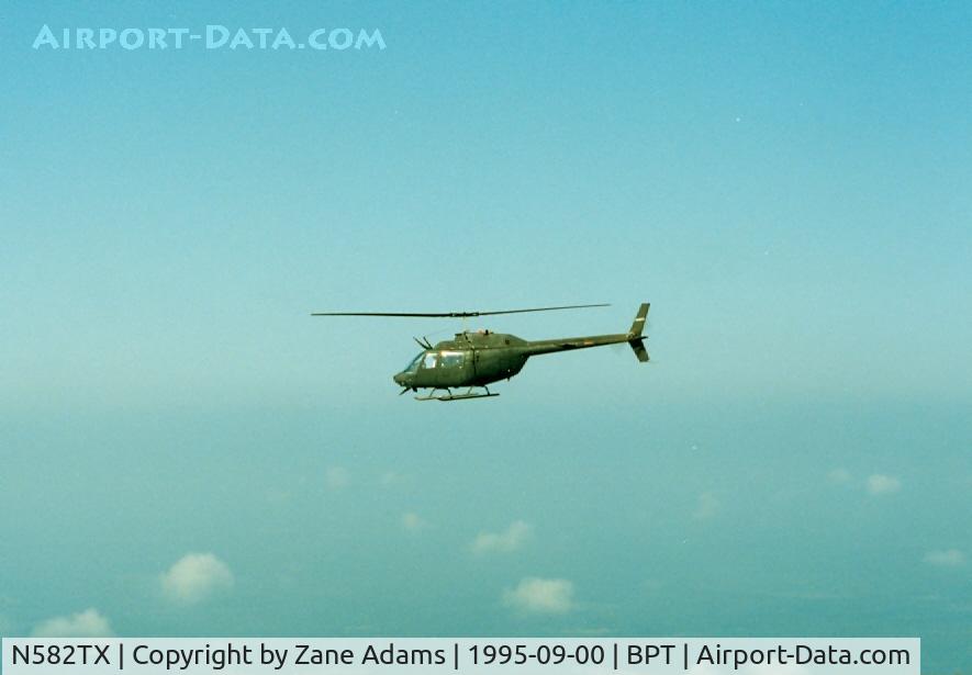 N582TX, 1971 Bell OH-58A C/N 71-20690, On the way to Beaumont for an Airshow - Texas Air Command Museum - Taken from N565TX