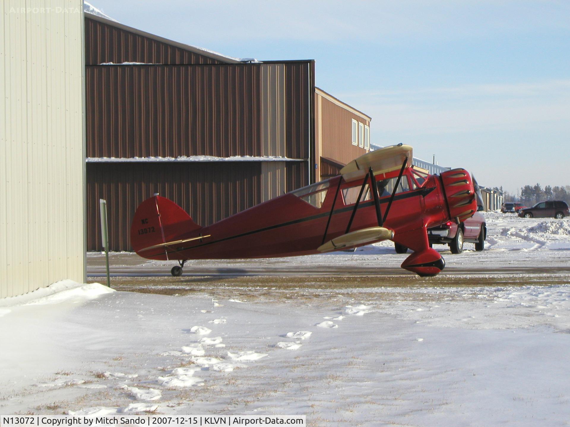N13072, 1933 Waco UIC C/N 3724, Starting up infront of its hangar.
