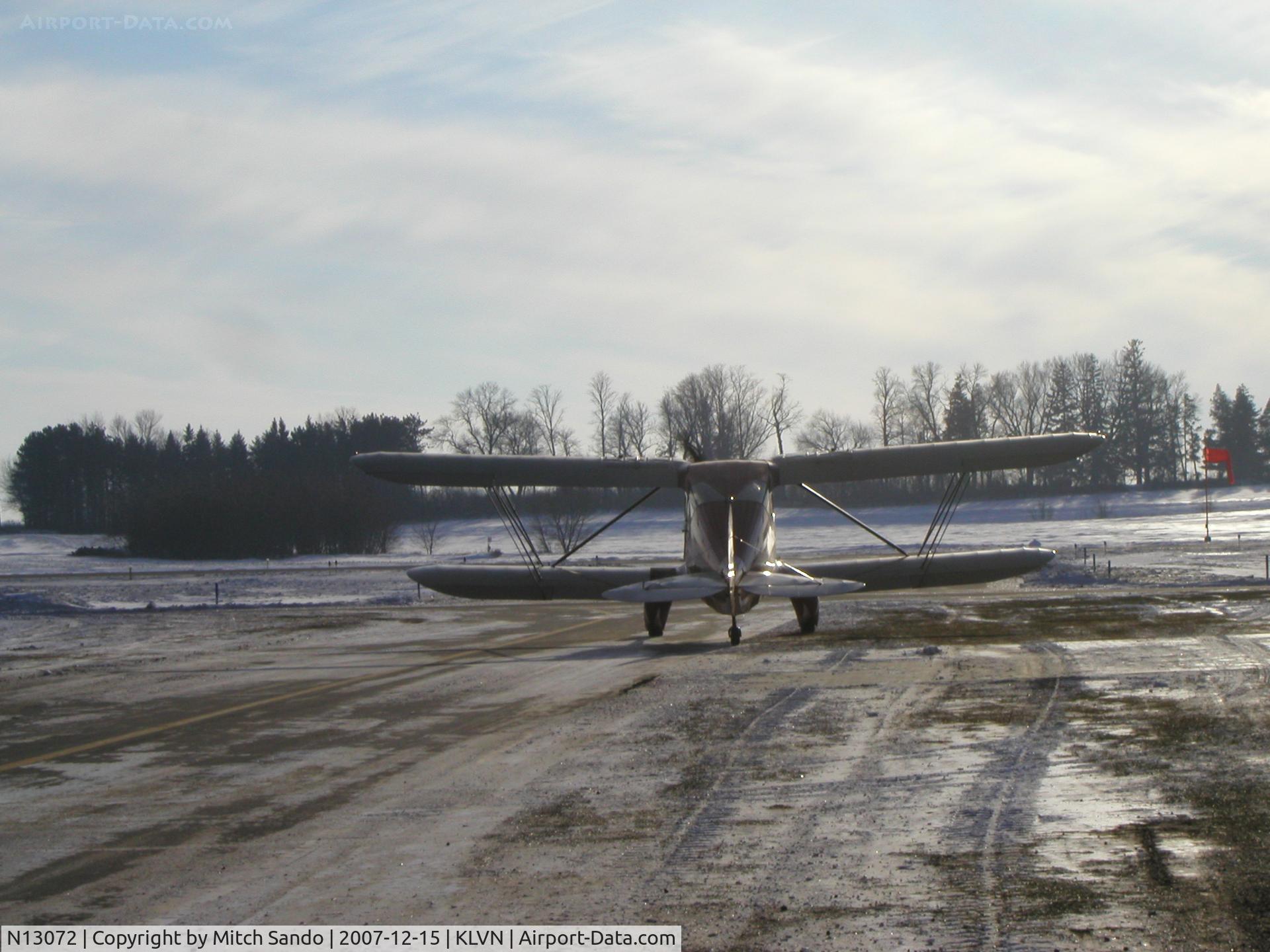 N13072, 1933 Waco UIC C/N 3724, Starting up infront of its hangar.