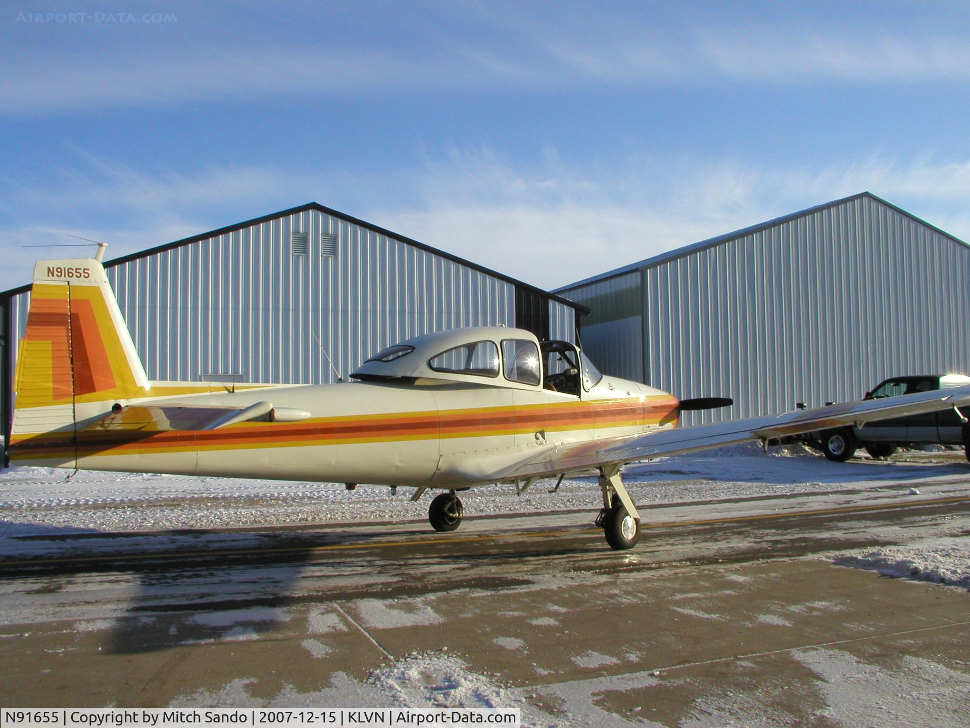 N91655, 1946 North American Navion (NA-145) C/N NAV-4-405, Parked outside the hangar.
