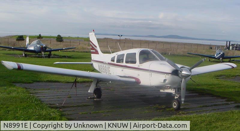 N8991E, 1976 Piper PA-28R-200 Cherokee Arrow C/N 28R-7635220, Old paint job on Arrow.