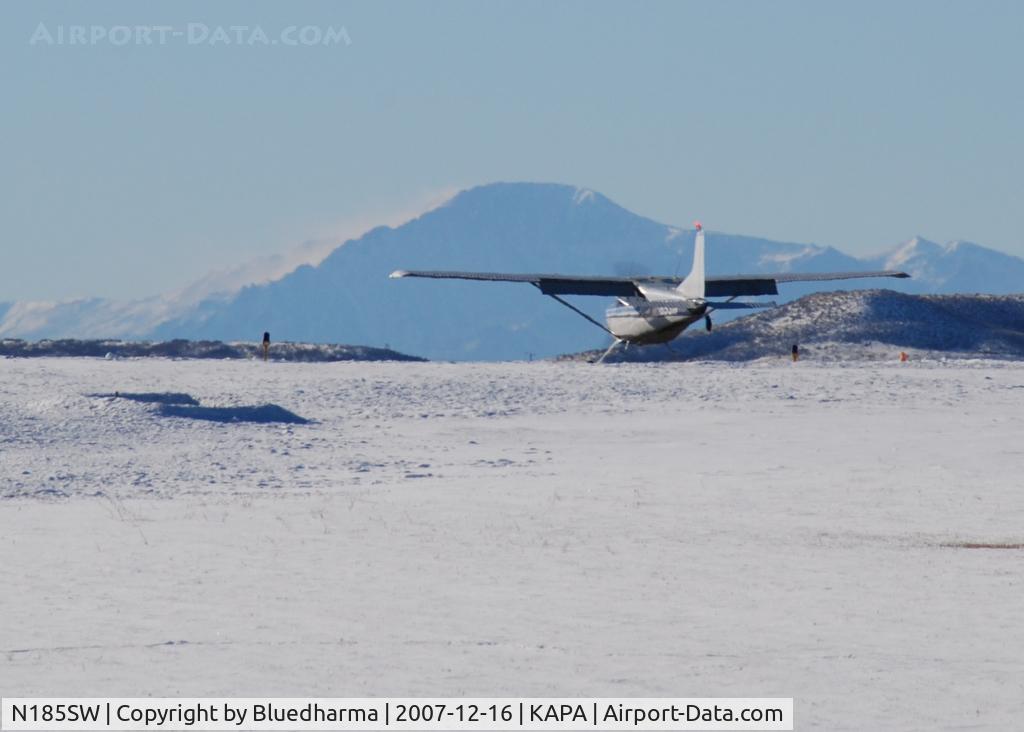 N185SW, 1977 Cessna A185F Skywagon 185 C/N 18503199, Landing on 17L with Pikes Peak in the background.