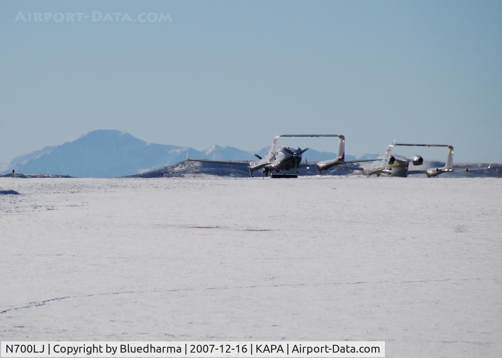 N700LJ, 2006 Adam Aircraft A700 C/N 0002, On 17L with n504ax for formation takeoff, Pikes Peak in the background.