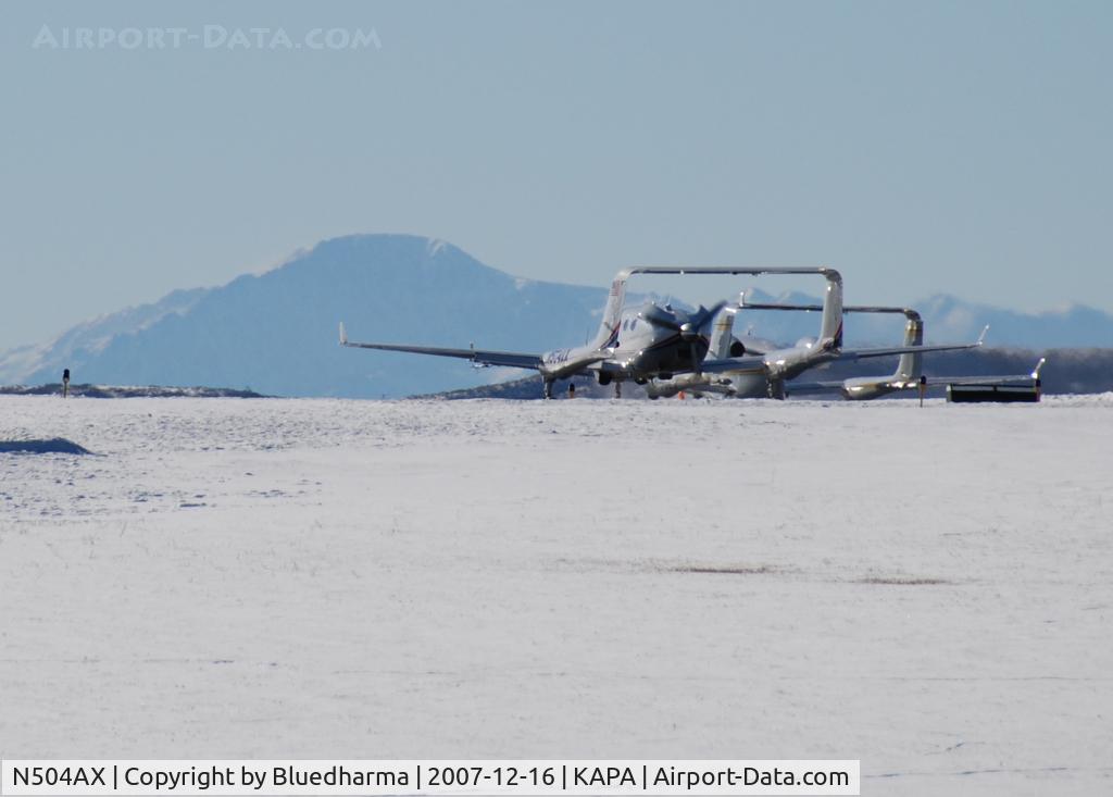N504AX, 2004 Adam Aircraft A500 C/N 0004, Formation takeoff on 17L with n700lj with Pikes Peak in the background.