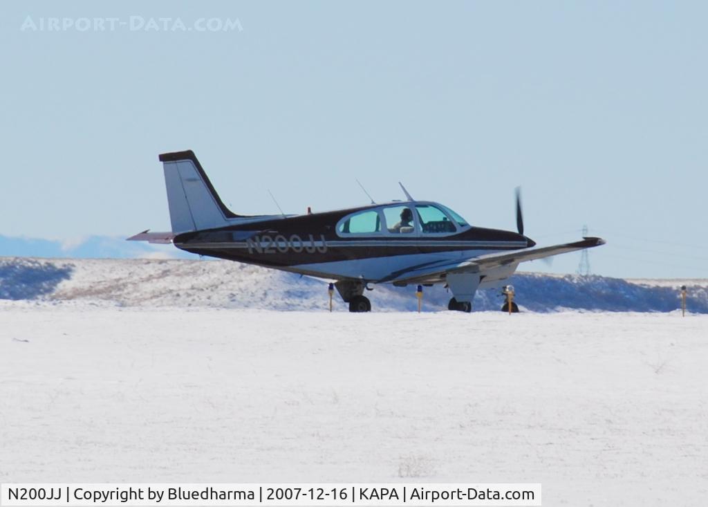 N200JJ, 1966 Beech 35-C33A Debonair C/N CE-112, Taxi to takeoff on 17L