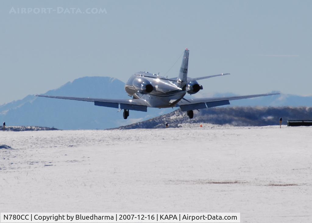N780CC, 2006 Cessna 560XL C/N 560-5597, Landing on 17L, with Pikes Peak in the background.