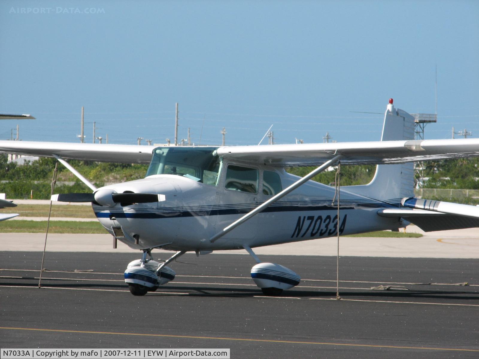 N7033A, 1956 Cessna 172 C/N 29133, Just standing at Key West international