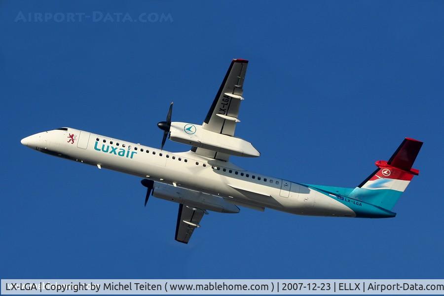 LX-LGA, 2007 De Havilland Canada DHC-8-402Q Dash 8 C/N 4159, Taking off on a cold winter afternoon on runway 06