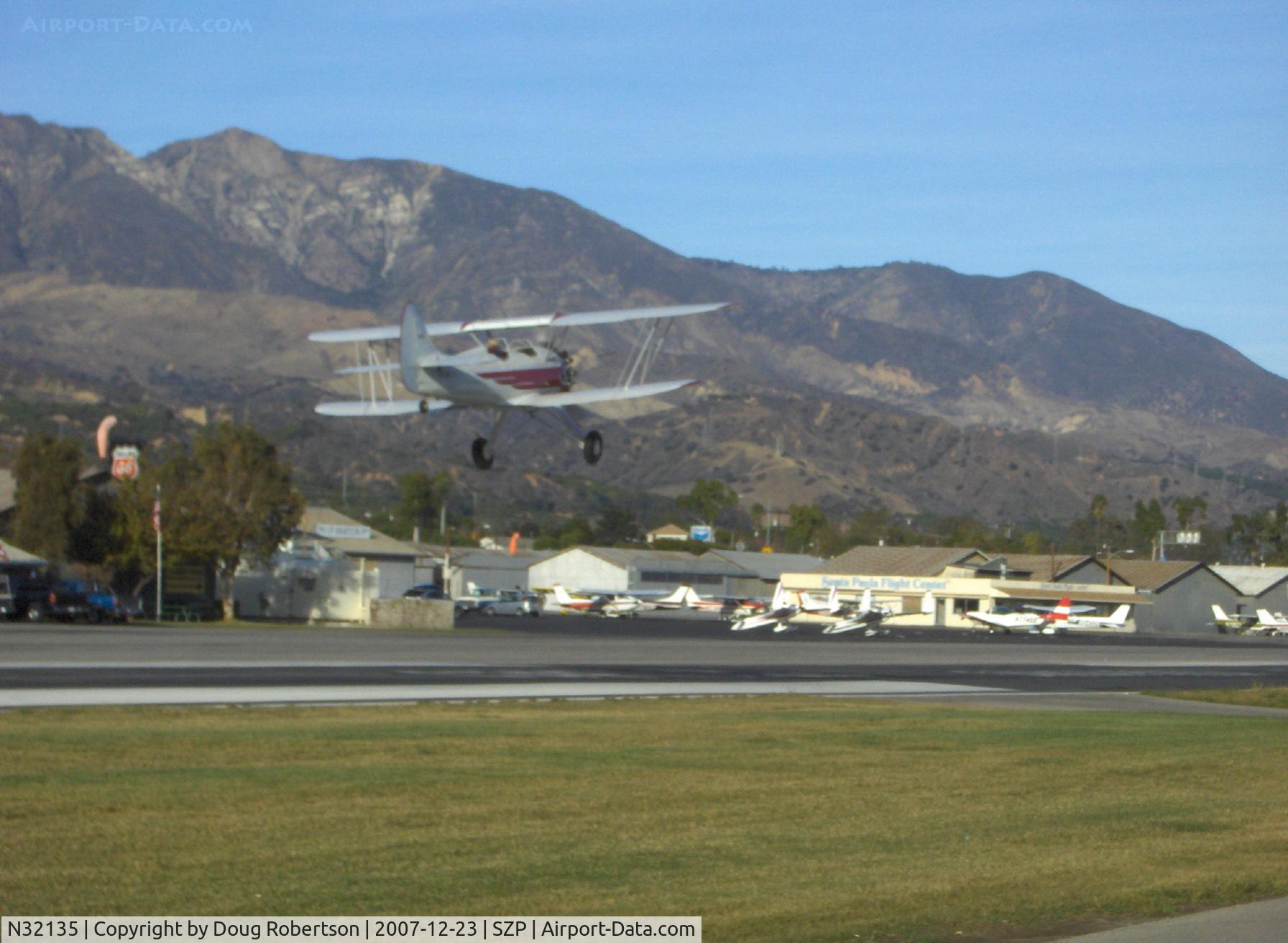 N32135, 1941 Waco UPF-7 C/N 5767, 1941 Waco UPF-7, Continental W670 220 Hp, takeoff climb Rwy 04