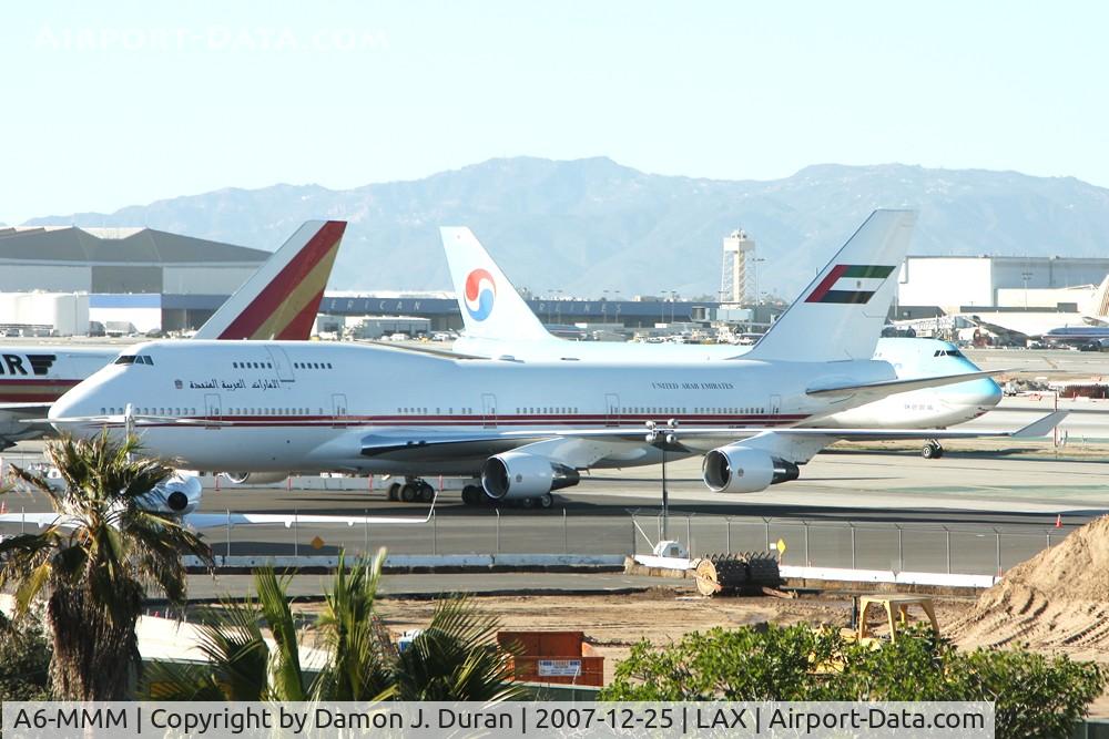 A6-MMM, 1998 Boeing 747-422 C/N 26906, Parked near sister ship A6-HRM