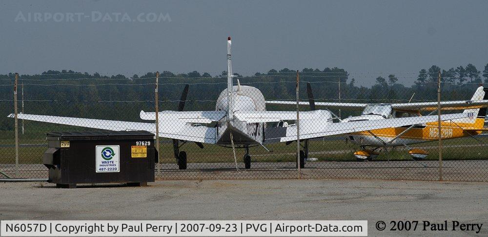 N6057D, 1979 Beech 95-B55 (T42A) Baron C/N TC-2233, Sort of jumps at you, gets your attention...nevermind the garbage