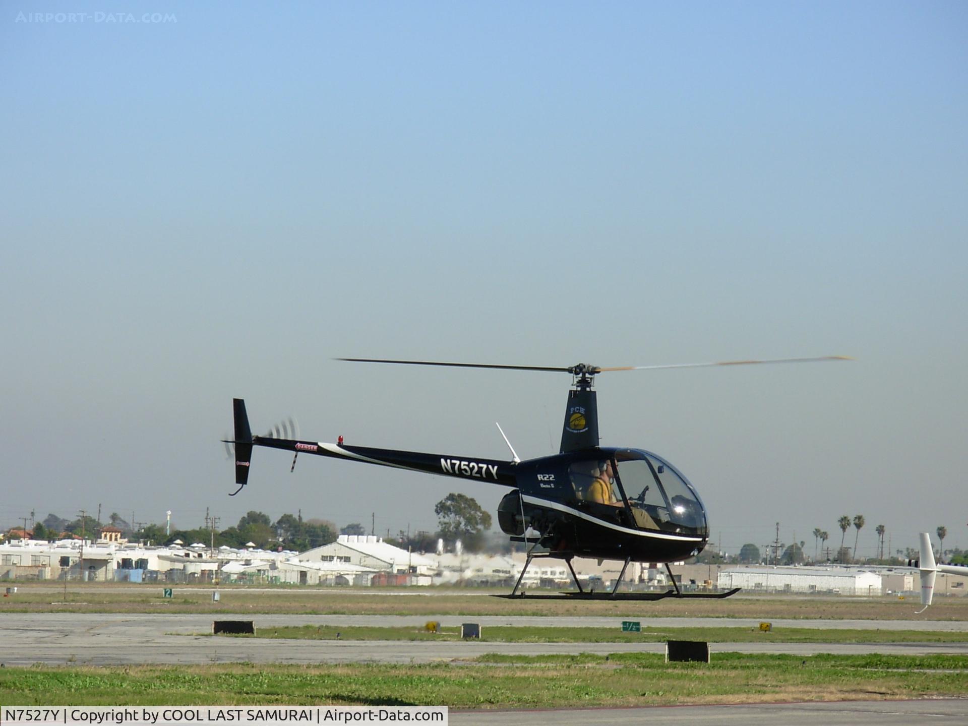 N7527Y, 2004 Robinson R22 Beta C/N 3593, 27Y hovering on TOA Ramp