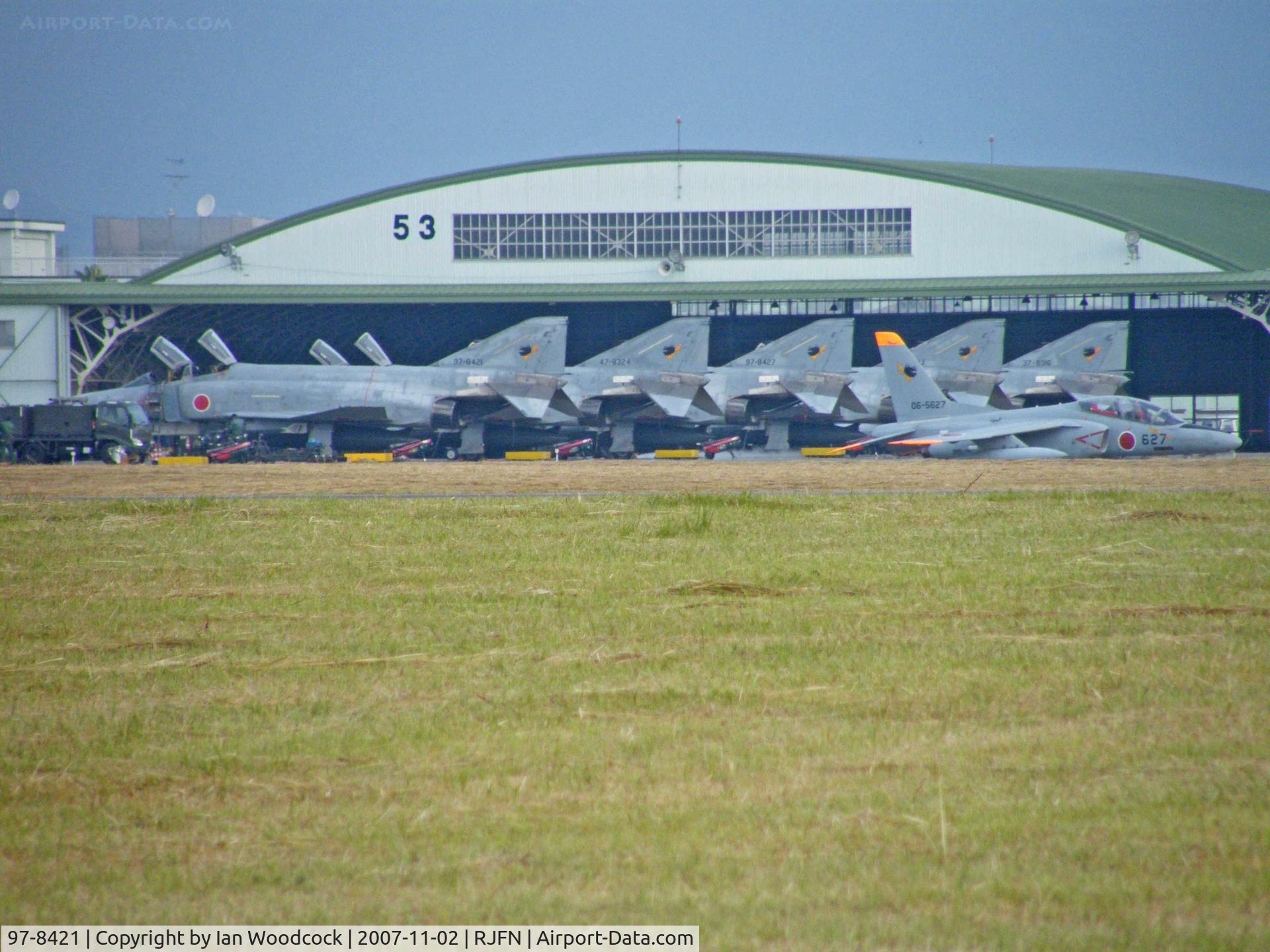 97-8421, Mitsubishi F-4EJ Kai Phantom II C/N M121, McDonnell-Douglas F-4EJ/Nyutabaru AB (heads a line of Phantoms on the ramp)