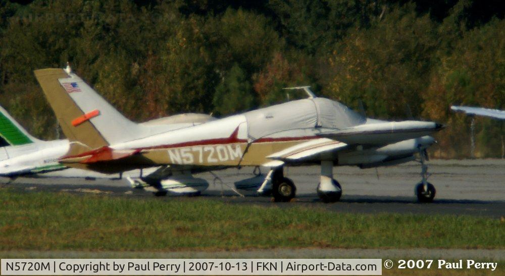N5720M, 1968 Cessna 310P C/N 310P0020, Seen from way across the field