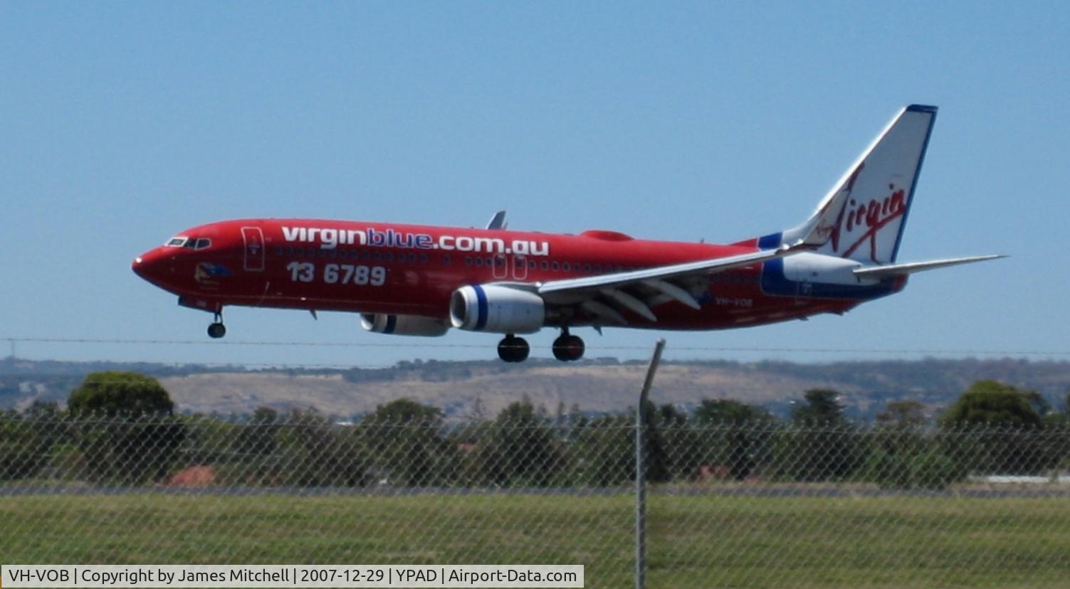 VH-VOB, 2002 Boeing 737-8BK C/N 30622, Landing Rwy 05, on a hot summers day!