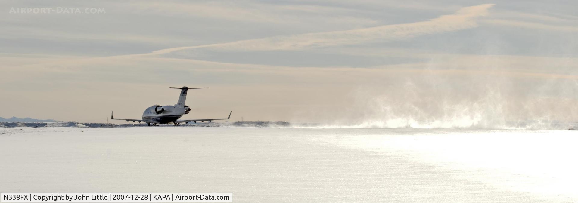 N338FX, 2006 Bombardier Challenger 604 (CL-600-2B16) C/N 5656, Rooster Snow Tails on Take-Off 17L