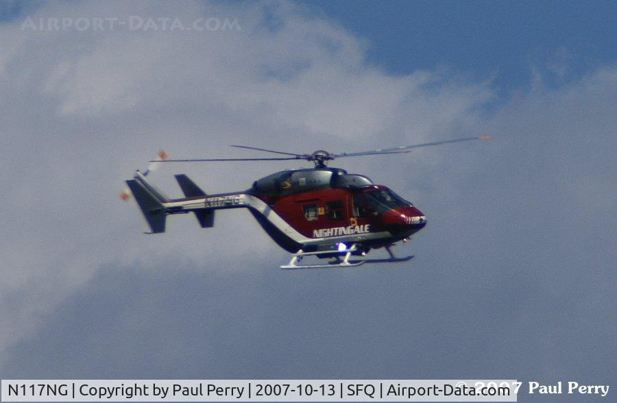 N117NG, 1986 Eurocopter-Kawasaki BK-117A-4 C/N 7083, Nightengale, a local medevac helo, looking for an LZ at Peanut Fest