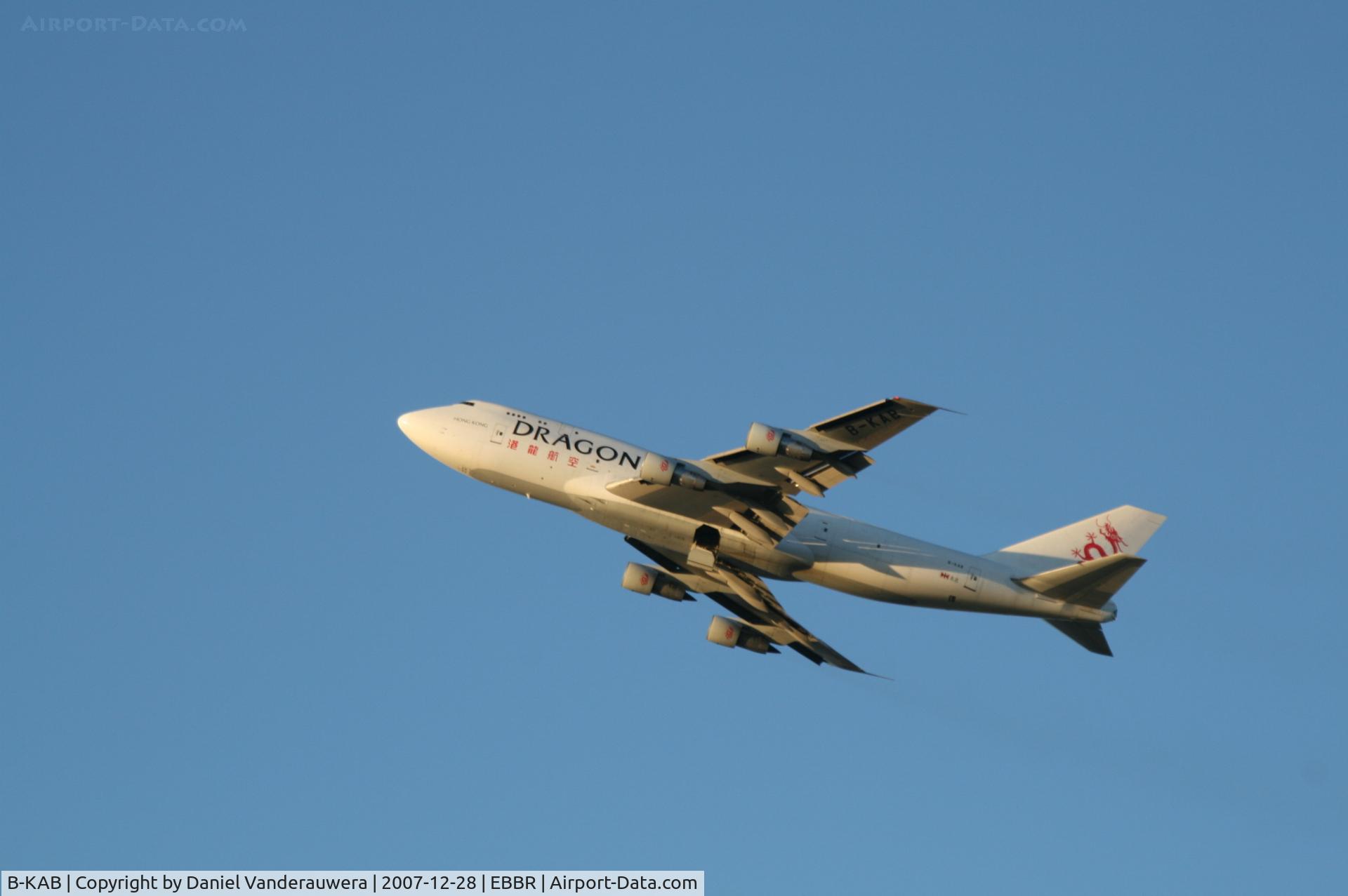B-KAB, 1986 Boeing 747-312 C/N 23409, taking off from rwy 25R