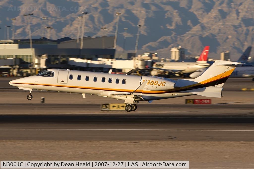 N300JC, 2007 Learjet 45 C/N 340, CECO's brand new 2007 Bombardier Learjet 45 N300JC from Reno/Tahoe Int'l (KRNO) landing on RWY 25L in nice evening light.  The company's former plane was a 2002 Lear 45 (N300JC, c/n 45-209).