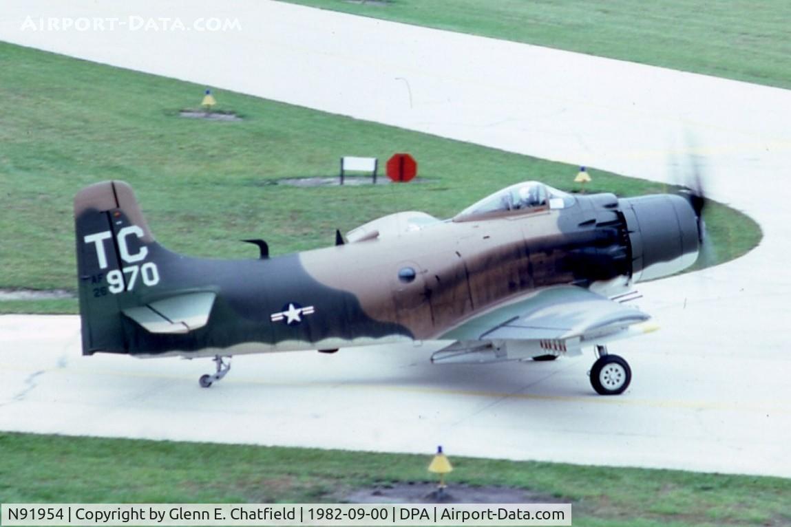 N91954, Douglas AD-4 C/N 7770, Taxiing by the control tower.  A-1D 126970
