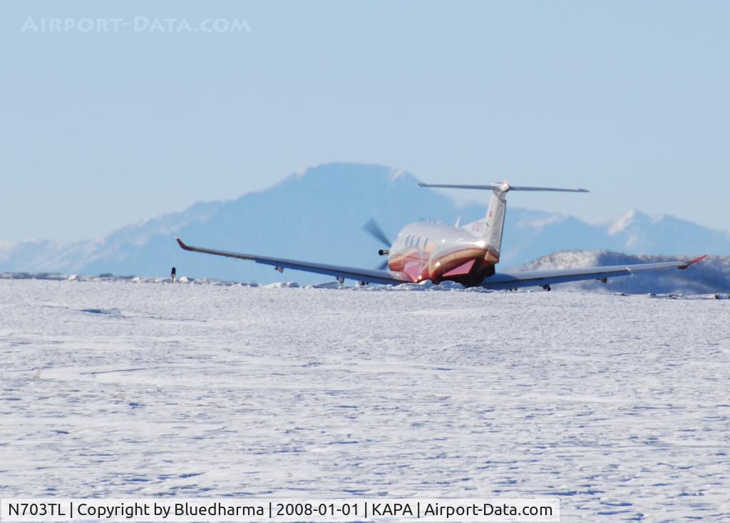 N703TL, 2006 Pilatus PC-12/47 C/N 703, Takeoff on 17L with Pikes Peak in the background.