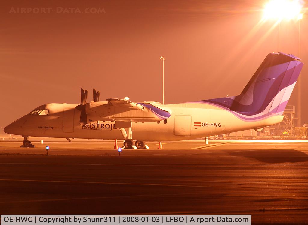 OE-HWG, 1991 De Havilland Canada DHC-8-102 Dash 8 C/N 289, Parked at the general aviation apron during night